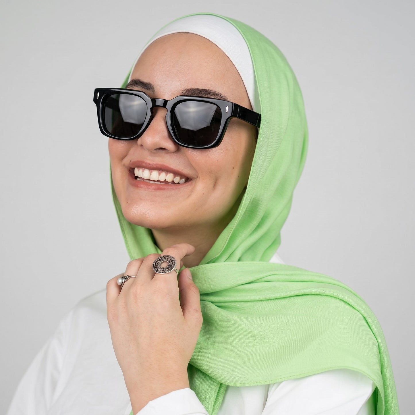 Nadaraty eyewear H 158 black acetate square sunglasses with dark polarized lenses and temple embellishments.
