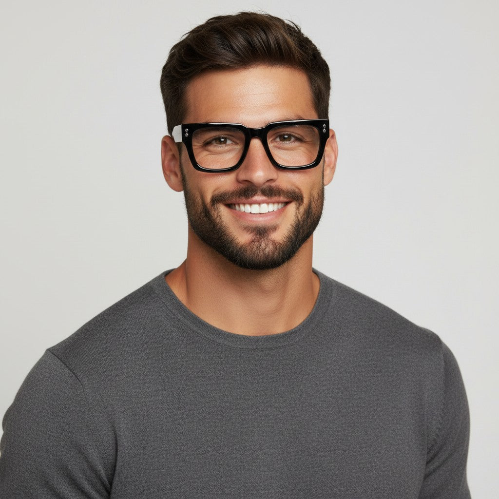 Nadaraty eyewear black acetate square frame glasses with Prada logo on the temple.