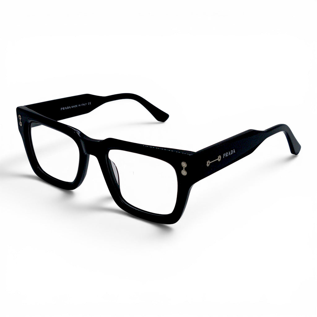 Nadaraty Eyewear black acetate rectangular eyeglasses with silver accents and Prada logo on the temple.