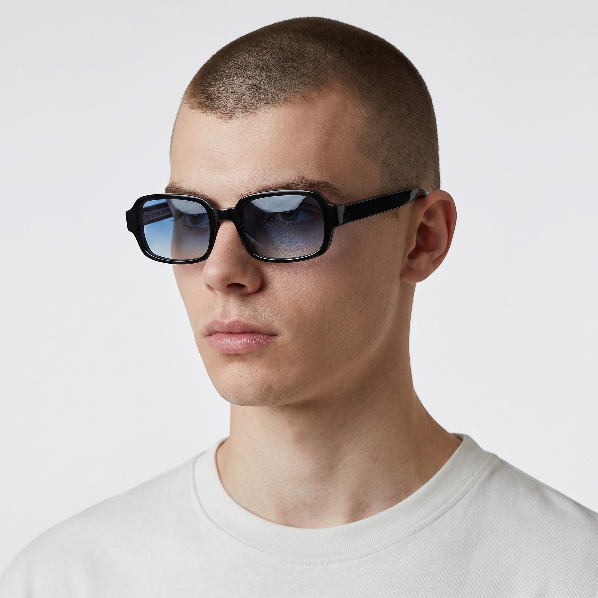 nadaraty eyewear Horus Dante h188 black acetate sunglasses with gradient blue lenses and thick rims.