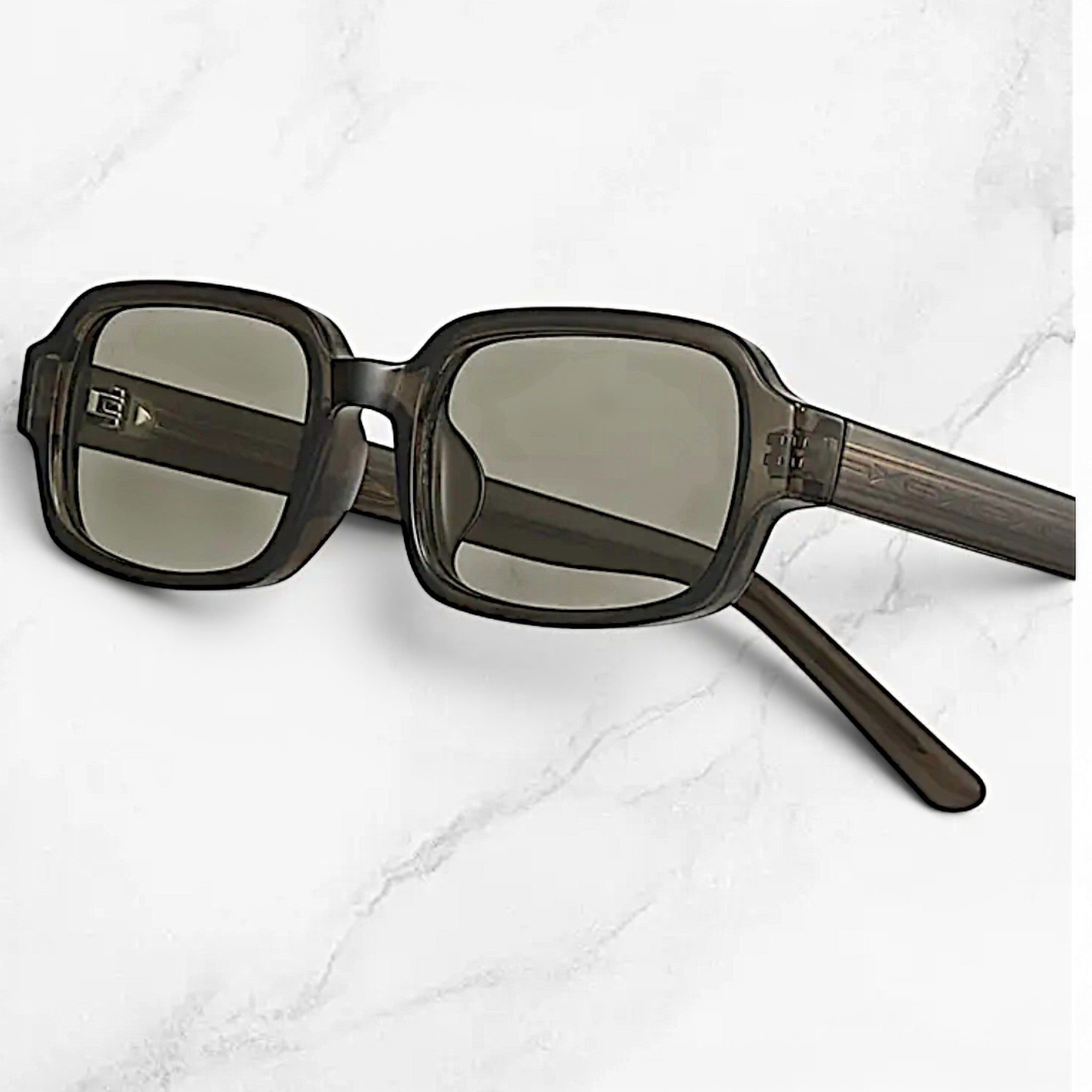Nadaraty eyewear Horus Dante h188 sunglasses with a thick, rectangular acetate frame in a smoky grey color and grey tinted lenses.