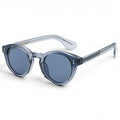 nadaraty eyewear Horus Darko H 194 translucent grey acetate round sunglasses with dark grey lenses.