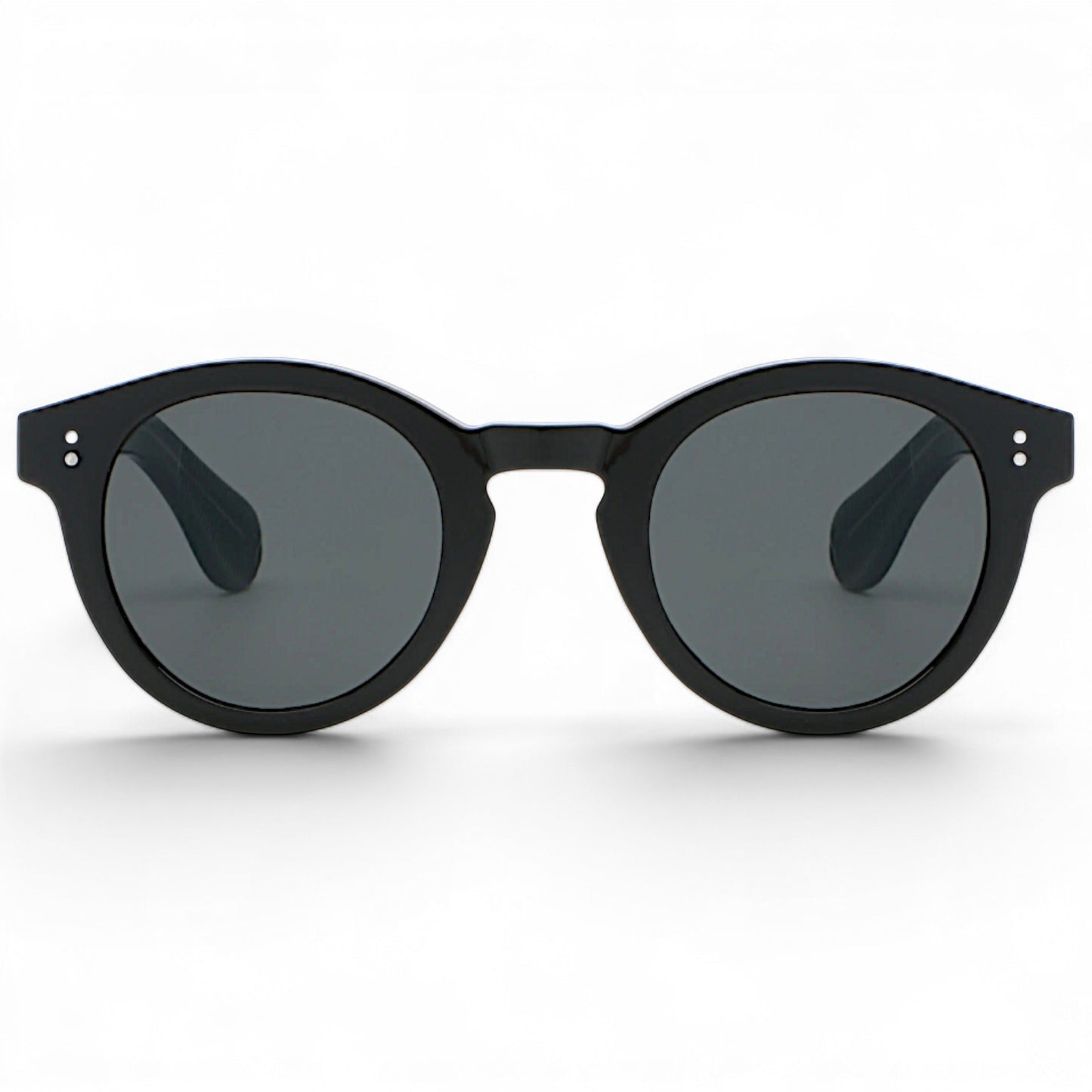 nadaraty eyewear Horus Darko H 194 black round acetate sunglasses with dark grey lenses and silver dot accents.