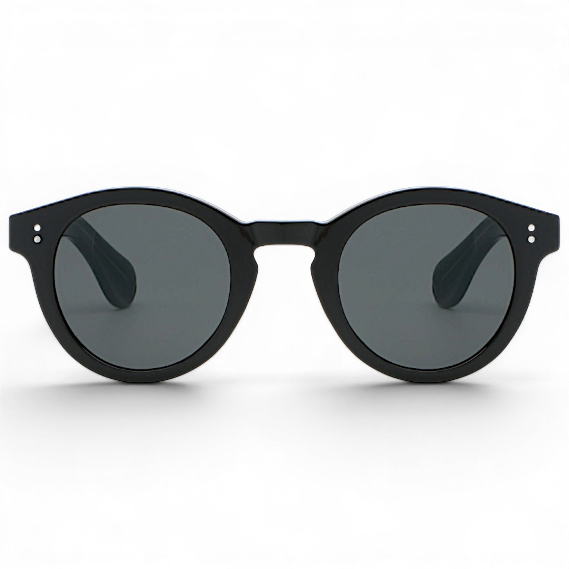 nadaraty eyewear Horus Darko H 194 black round acetate sunglasses with dark grey lenses and silver dot accents.
