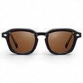 Nadaraty Eyewear Horus Delta H 82 black acetate sunglasses with brown lenses and diamond detail.