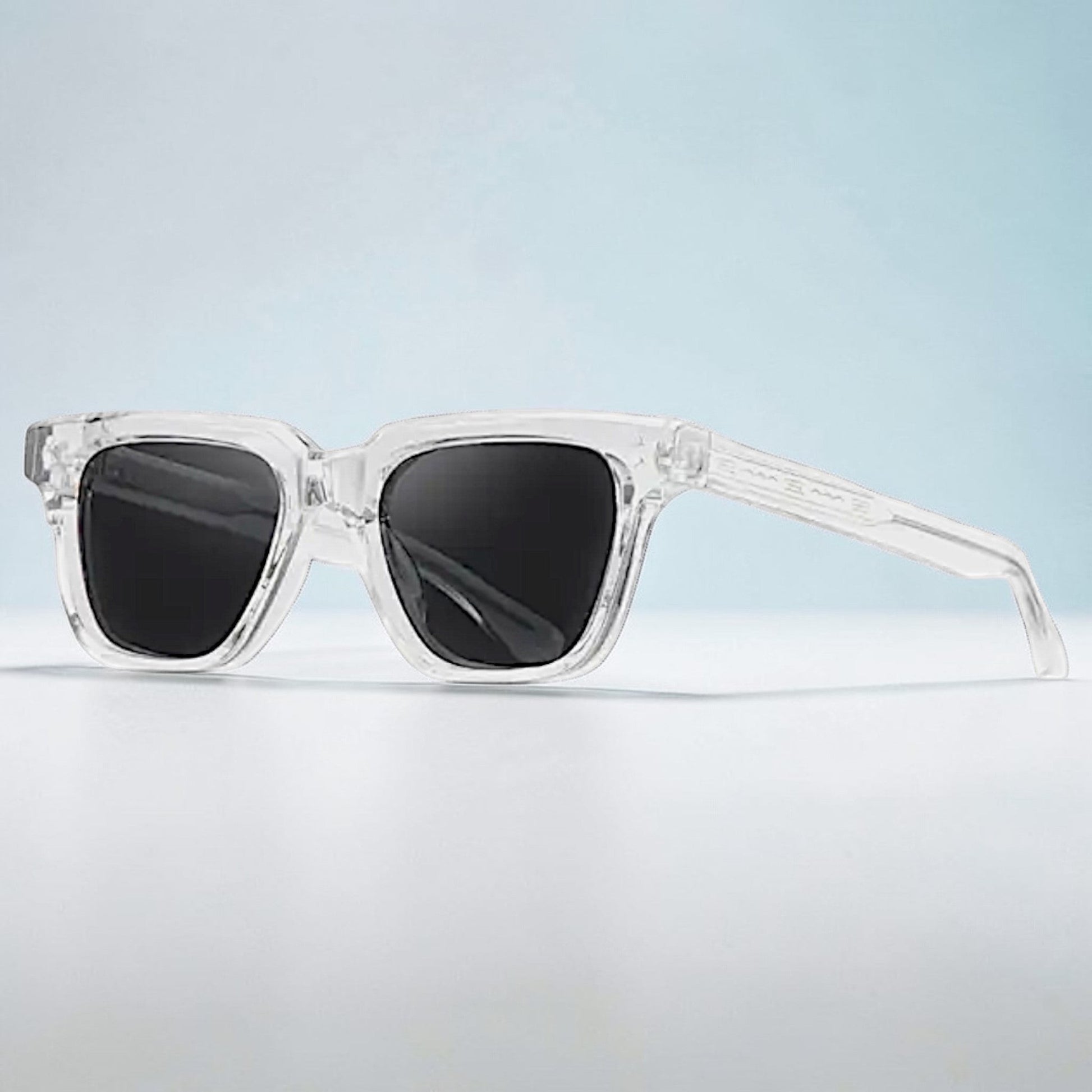 nadaraty eyewear Horus Fit H 133 clear acetate square sunglasses with black lenses.