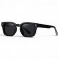 nadaraty eyewear Horus Milano H 158 black acetate square frame sunglasses with dark lenses.