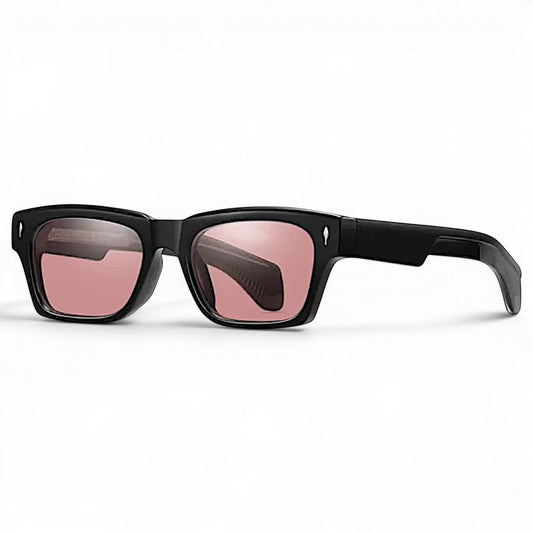 Nadaraty eyewear Horus Oryx - H 140 black acetate sunglasses with pink tinted lenses and thick rectangular frames.