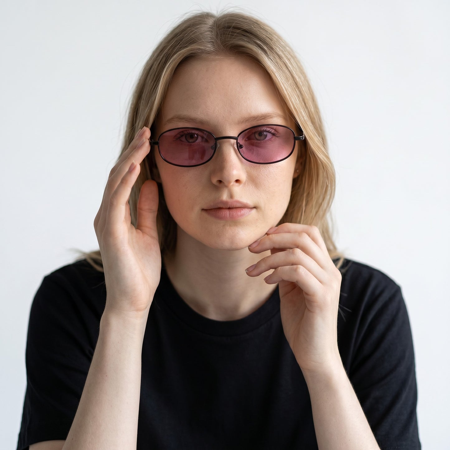 nadaraty eyewear Horus Wolf H 191 oval sunglasses with black frames and pink lenses.