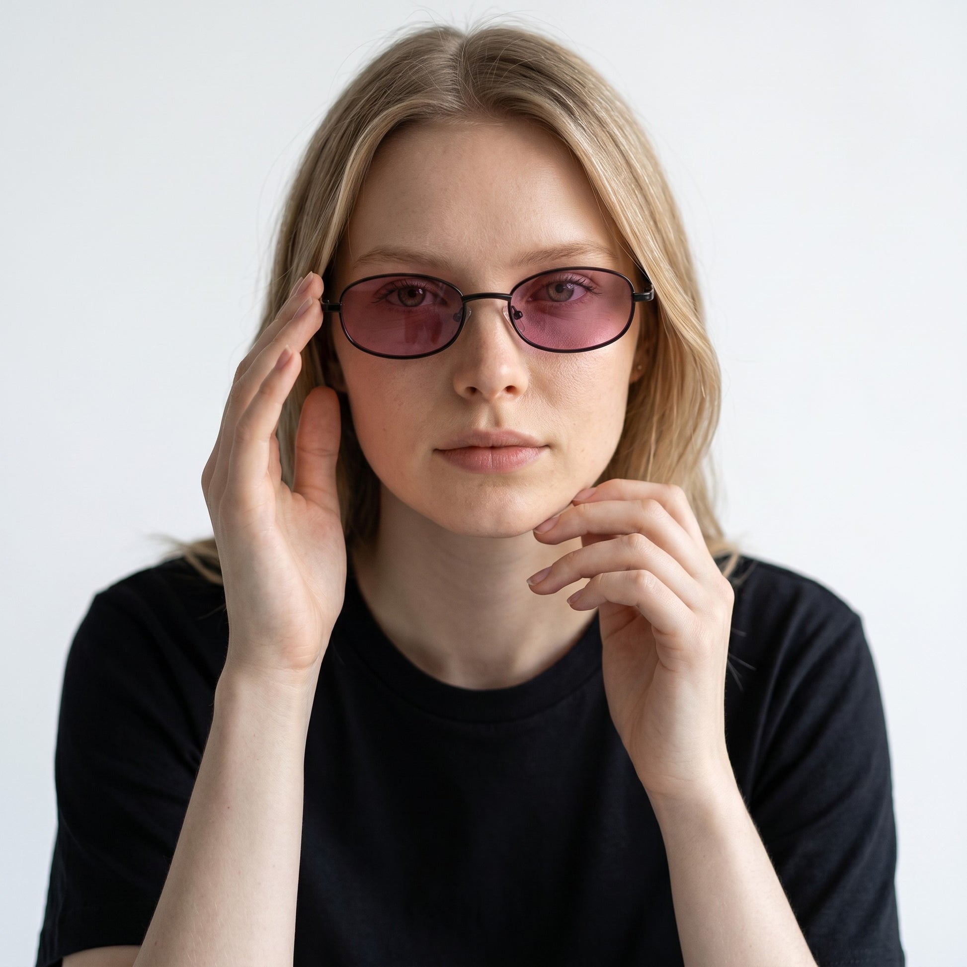 nadaraty eyewear Horus Wolf H 191 oval sunglasses with black frames and pink lenses.