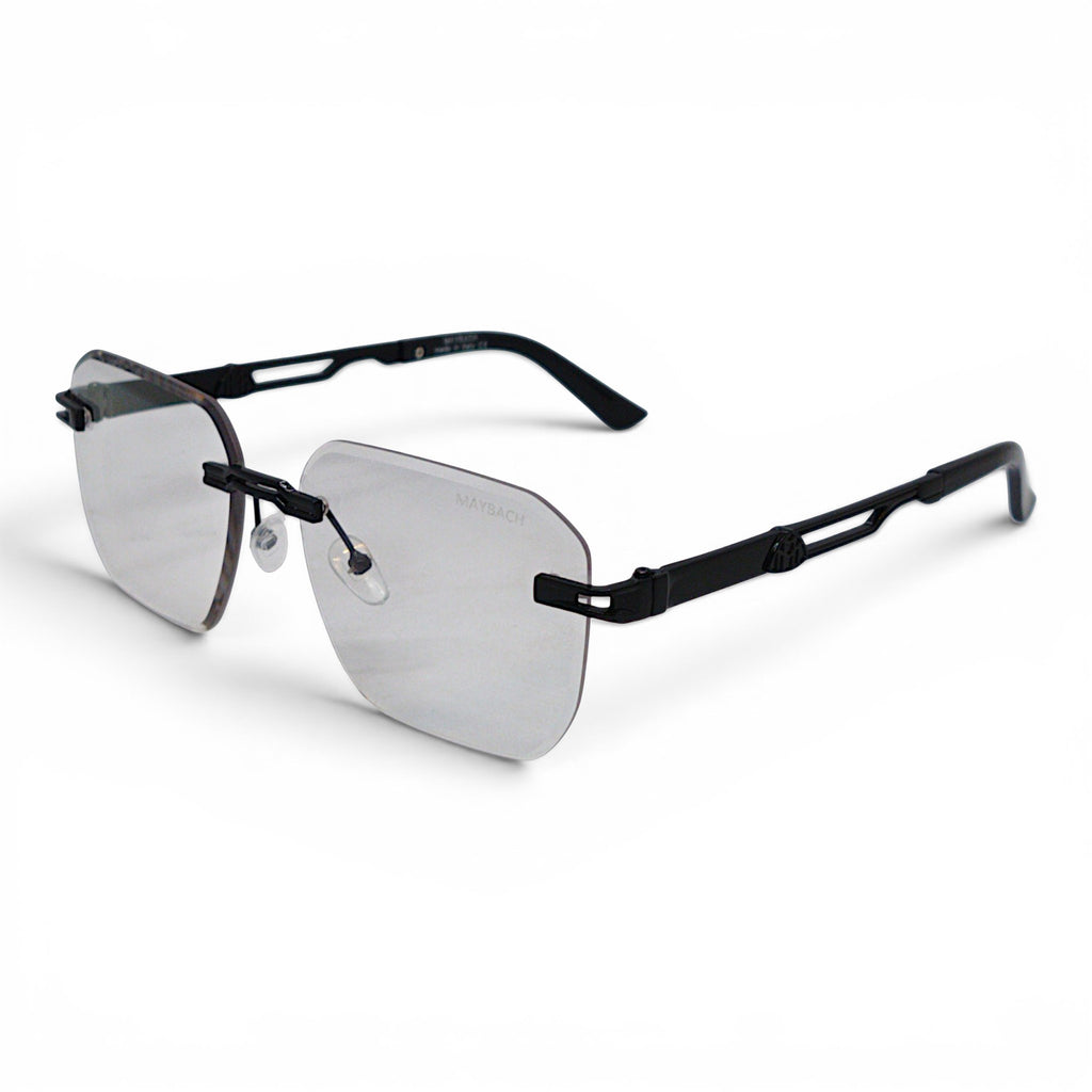 nadaraty eyewear Maybach rimless photocromic blue cut sunglasses with silver lenses and black arms.