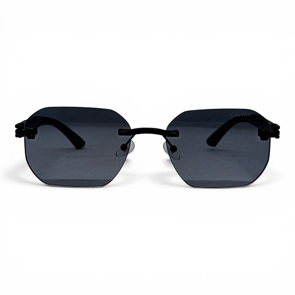 nadaraty eyewear Photocromic ctr 01 rimless octagonal sunglasses with dark grey lenses and black arms.