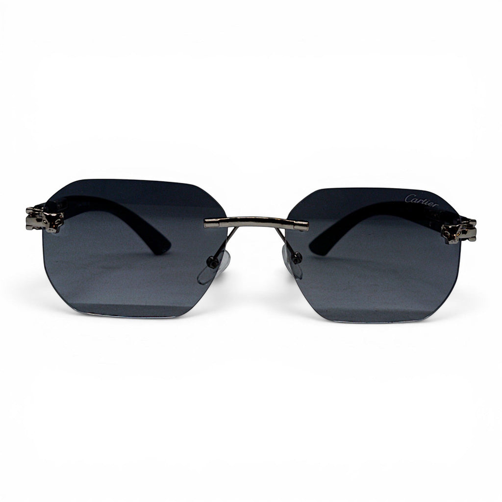 nadaraty eyewear Photocromic ctr 01 rimless octagonal sunglasses with dark grey lenses and silver temple accents.