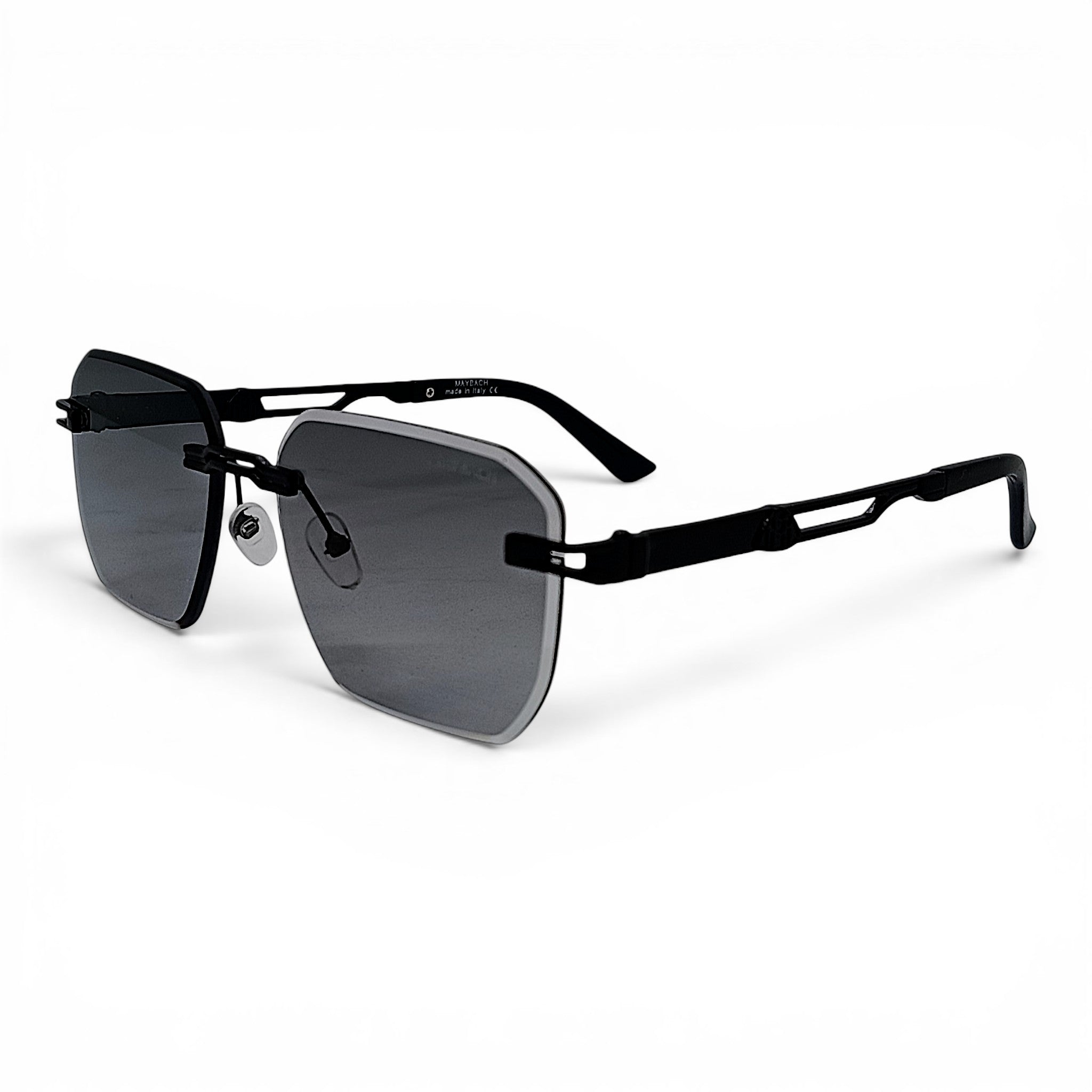 nadaraty eyewear Photocromic May 02 rimless sunglasses with dark grey lenses and black metal arms.